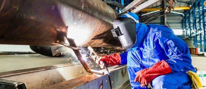 welder using PPE to carry out job safely