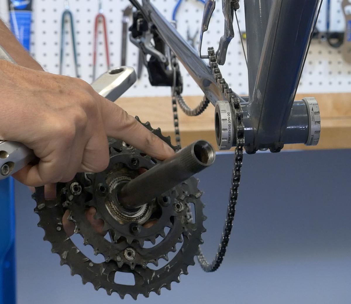 Two-piece crankset with a thru-spindle bottom bracket